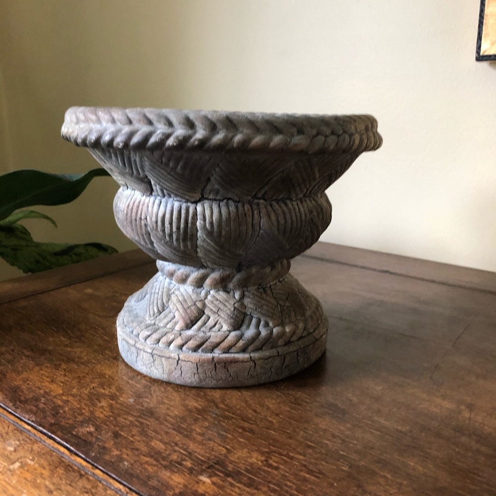 Grecian style textured urn. Grey tones.